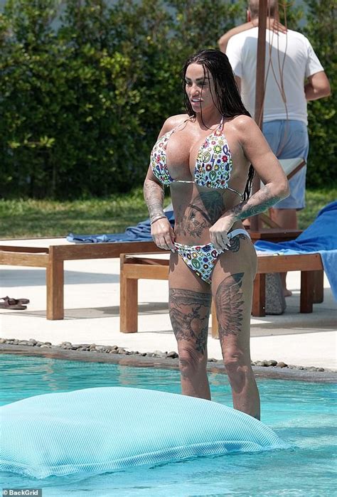 katie price flaunts her biggest boobs ever in a tiny graphic printed bikini trends now