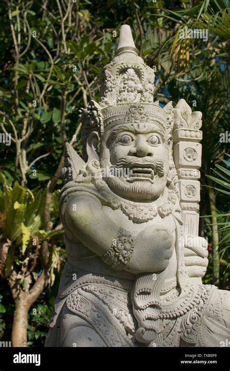 Beautiful Balinese Stone Guardian Statue Located At The Ubud Royal