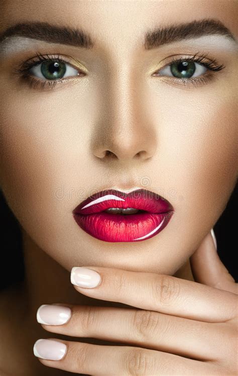 Young Model With Lollipop Glossy Lips Fashion Makeup Stock Photo