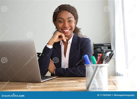 Young Black Businesswoman Sitting At Office Desk Stock Photo Image Of