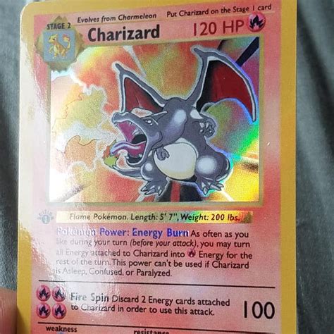 $14999.99 and other cards from base set 1st edition sing. Holo Custom Shiny Charizard Pokemon Card 1st edition