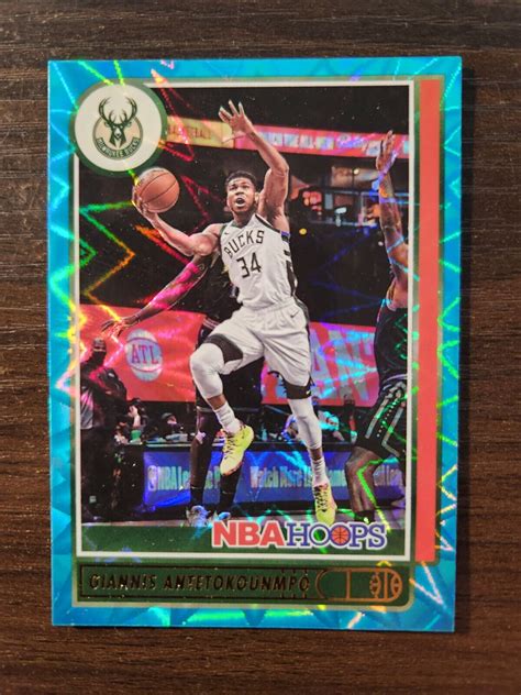 2021 22 PANINI HOOPS 103 GIANNIS ANTETOKOUNMPO TEAL EXPLOSION BUCKS SP