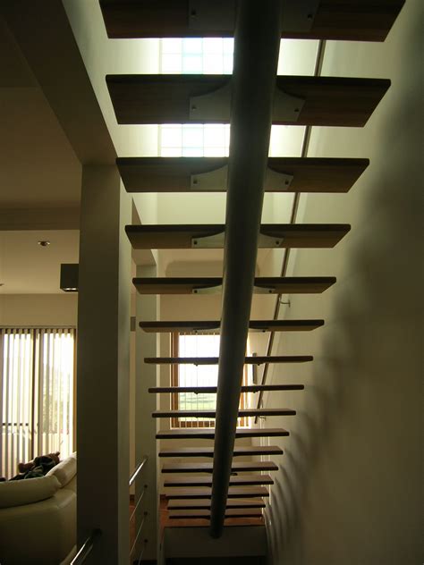By arnaud & delrue architectes. Modern steel and wood indoor stairs | Stainless Steel and ...