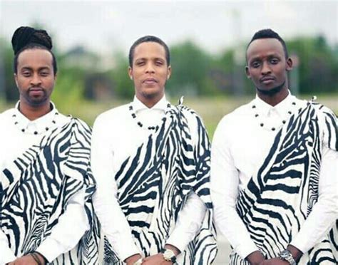 Rwandan Groomsmen In Zebra Print Mushanana Traditional Attire With Neck