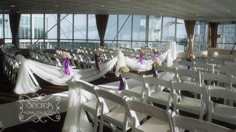 A Purple Wedding Ceremony And Reception Decoration With A