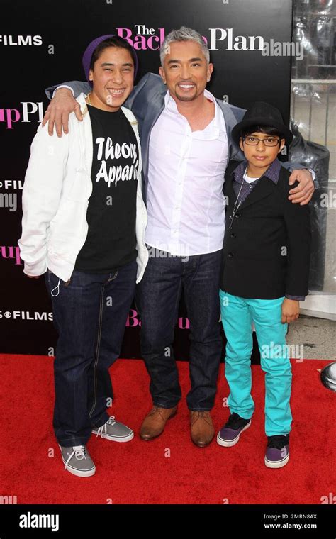 Cesar Millan With Sons Calvin And Andrea Walk The Red Carpet At The