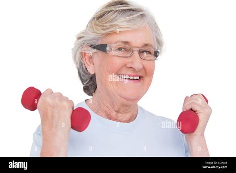 Senior Woman Lifting Hand Weights Stock Photo Alamy