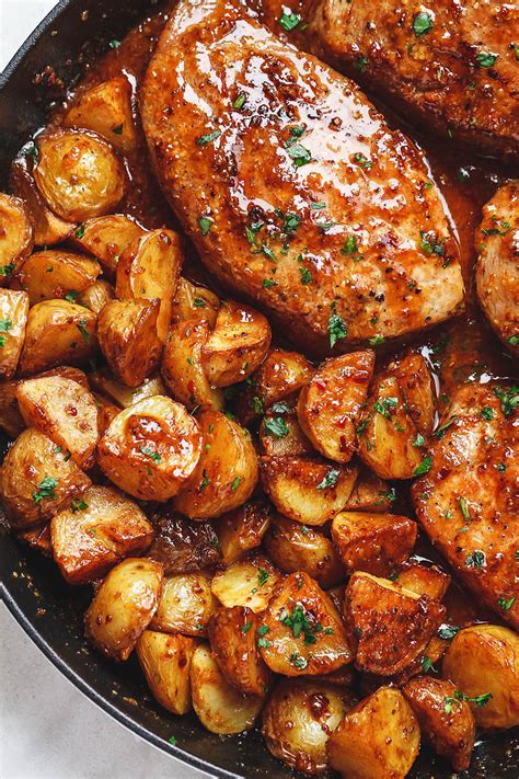 Our most trusted pork loin and potatoes recipes. Honey Mustard Pork Chops and Potatoes Recipe - Pork Chops ...