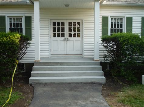 Mix the concrete until smooth and pour it into the mold. How to Build/Pour Concrete Steps | How To Build A House