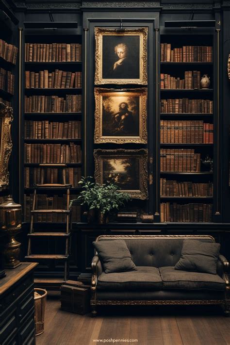 A Room With Bookshelves Couch And Paintings On The Wall In Front Of It