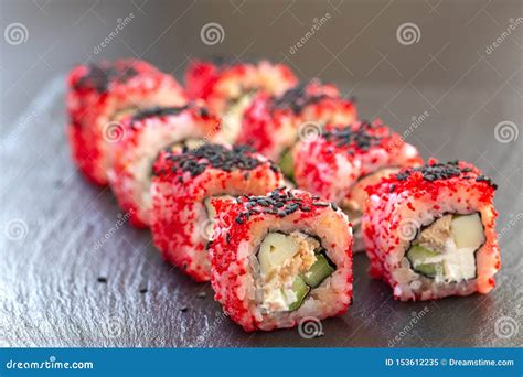 Fresh Traditional Japanese Sushi Rolls On Black Slate Selective Focus