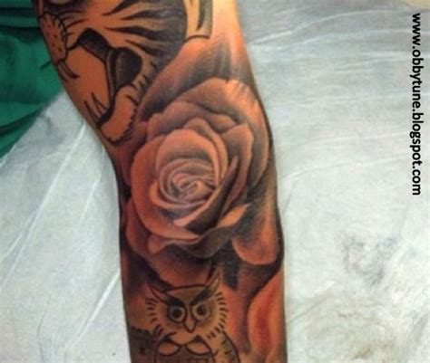 Justin bieber's angel wing tattoo is located next to the tat of a tiger's head on the outside of the singer's left arm, and was probably inked during the same session as his bible verse tattoo, in august 2013. XCLUSIVE 21 OF JUSTIN BIEBER's TATTOOS... - CELEBRITY BLOG