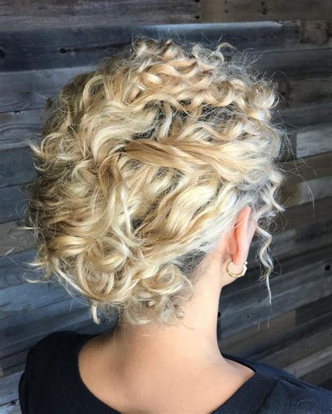 textured chignon hairstyle blonde updo curly hair updo curly hair types short curly hair