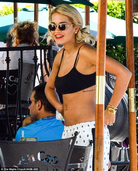 Rita Ora Shows Off Toned Stomach In A Revealing Casual Outfit As She Takes Her Pooch For A Walk