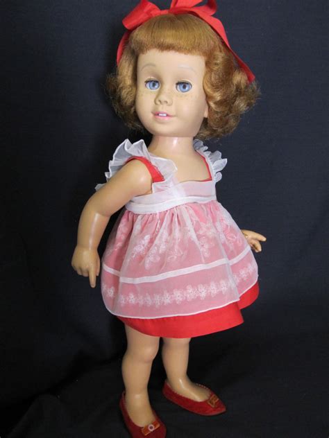 chatty cathy she was made by mattel a 1960 prototype with strawberry blonde hair and blue