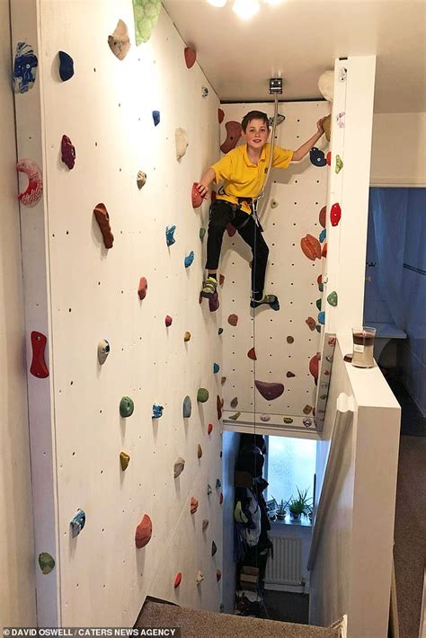 Savvy Father Creates Incredible Diy Climbing Wall For His Two Sons In