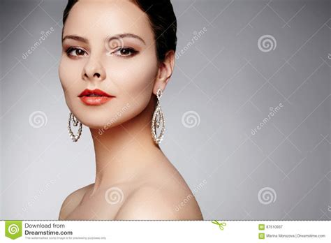 Beautiful Happy Woman In Luxury Fashion Earrings Diamond Shiny Jewelry