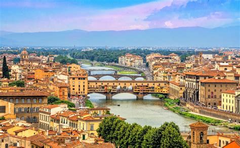 Aerial View Of Medieval Stone Bridge Ponte Vecchio Over Arno River In