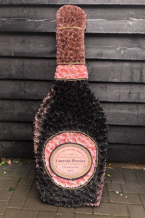LPR champagne | Funeral floral arrangements, Funeral flower