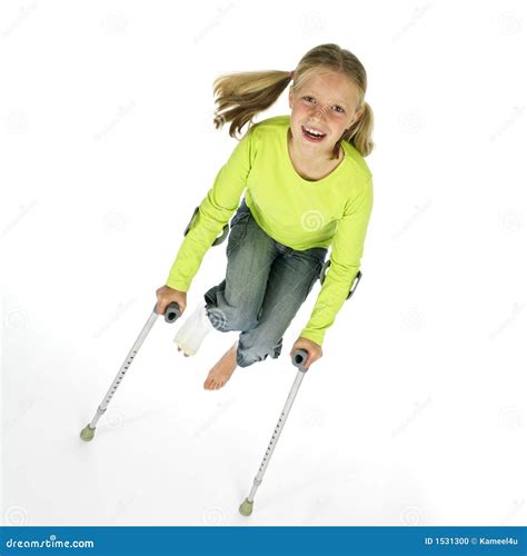 Girl With A Broken Leg Jumping On Crutches Stock Photo Image Of