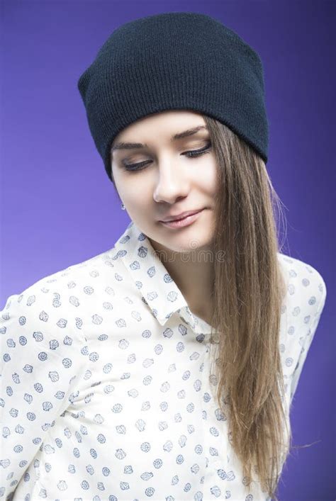 Positive Smiling Caucasian Girl Hat Looking Straight To Camera Against