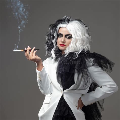 A Fatal Beauty In A Daring Fashion Image With Black And White Hair