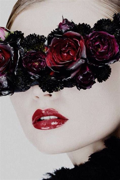 Woman Wearing Dark Red Roses Across Eyes And Red Lipstick High Fashion