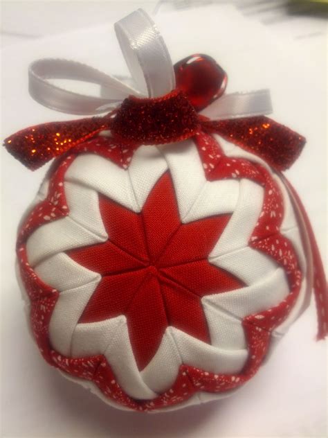 Diy Ornament Made Out Of Foam Ball Fabric Straight Pins And Ribbon
