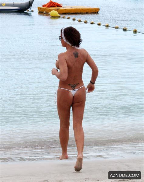 Danniella Westbrook Topless On The Beach While Enjoying A Sunshine