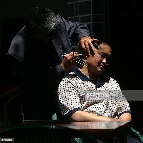 Chinese Ear Cleaning Photos And Premium High Res Pictures Getty Images