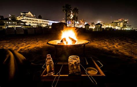 Maybe you would like to learn more about one of these? hotel del coronado fire pit s'mores at night | Coronado ...