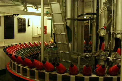 The hms belfast is one of london's most popular visitor attractions, a historic warship preserved by the imperial war museum. Inside the 6" turret shell room on the HMS Belfast 2007 ...