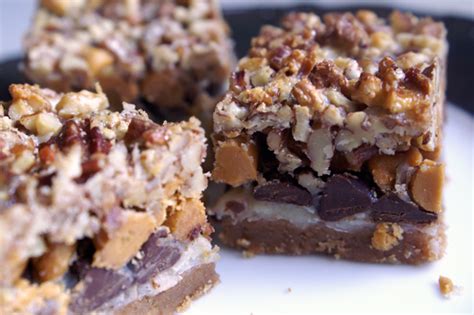 Layered chocolate pudding dessert is a sweet cookie crust that's layered with smooth whipped cream cheese, chocolaty pudding, and creamy whipped topping! seven-layer bars of my youth. - A Periodic Table