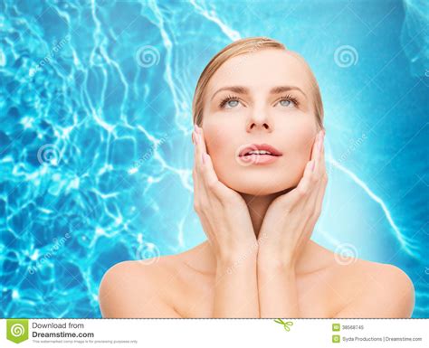 Beautiful Woman Touching Her Face And Looking Up Stock Image Image Of Looking Freshness 38568745
