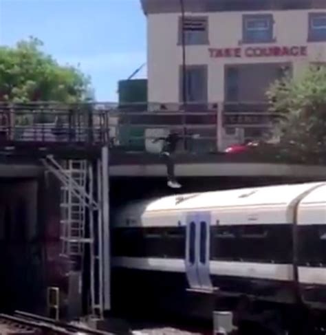 Watch Shocking Moment Young Man Jumps From Bridge To Roof Of Southeastern Train In London