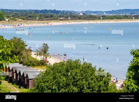 Studland Bay Beach And Beach Huts Dorset England Stock Photo Alamy