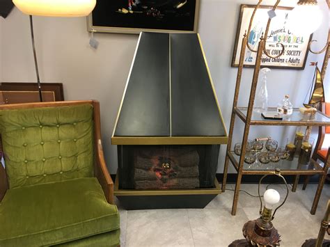 40 1/4 w x 19 3/4 h x 15 3/4 d. MCM electric fireplace sold by East Valley Antiques in ...