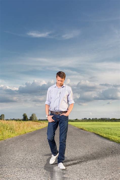Full Length Young Man Walking Empty Rural Road Stock Photos Free