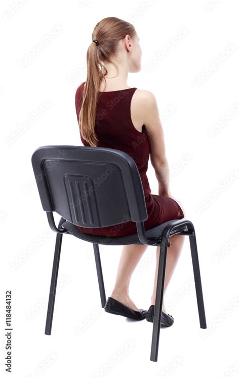 Back View Of Young Beautiful Woman Sitting On Chair Girl Watching