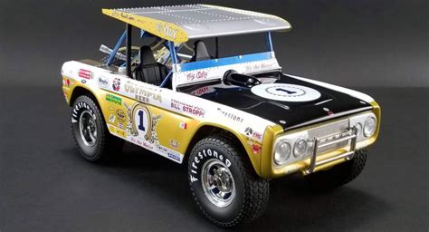 Greenlight Collectible 1970 Baja Bronco 1 Big Oly Tribute Edition Vel
