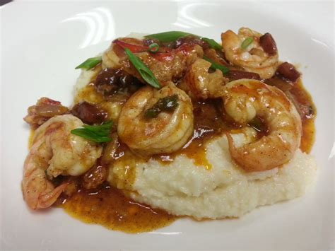 Shrimp And Lobster With Tasso Gravy Over Cheese Grits