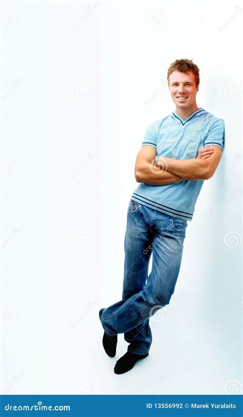 Cheerful Young Man Leaning Against Wall Stock Photo Image Of Modern