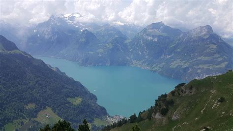 Oc 5312x2988 Majestic Mountains Over An Emerald Lake In Switzerland