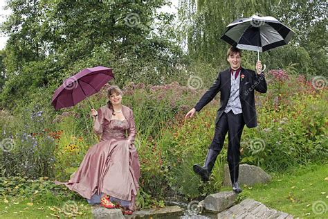 Funny Bride And Groom In Autumn At Small Creek Stock Image Image Of