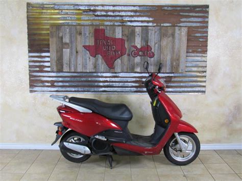 We review all four versions of this scooter sold over this short but popular run. Honda Elite 150 Motorcycles for sale