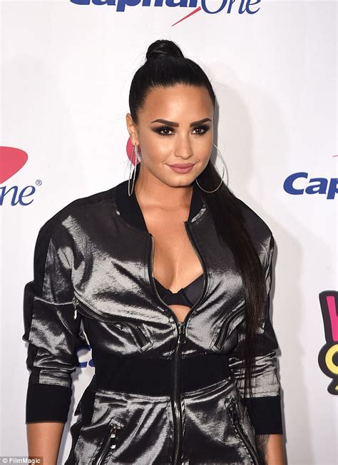 Demi Lovato Flashes Her Bra At Jingle Ball Daily Mail Online