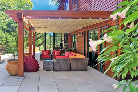 Wood pergolas look great but their function is often under utilized. Shade Fx Retractable Canopies - Rona Mantar