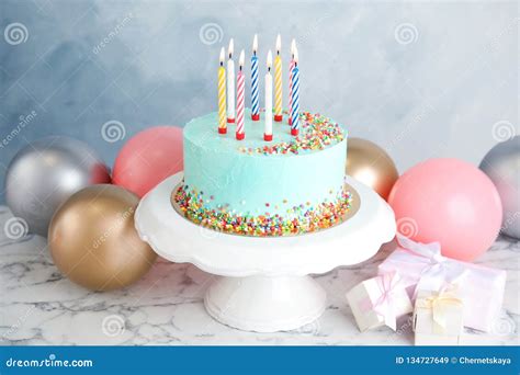 Fresh Delicious Birthday Cake Ts And Balloons On Table Stock Image