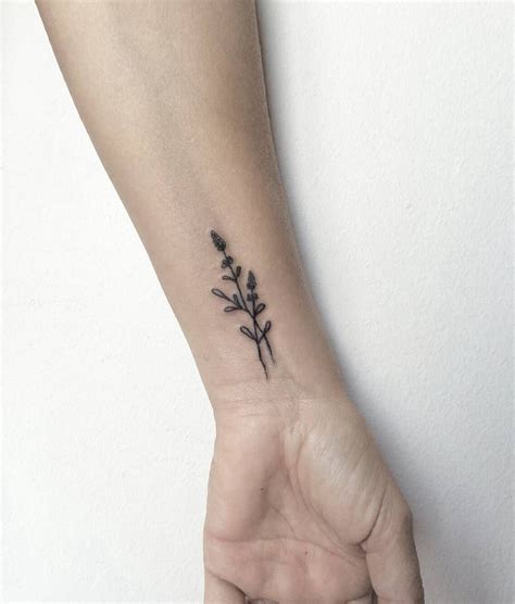 Tiny Floral Tattoo On Wrist By Marina Latre Tattoos For Women Floral Tattoo Flower Tattoo Back