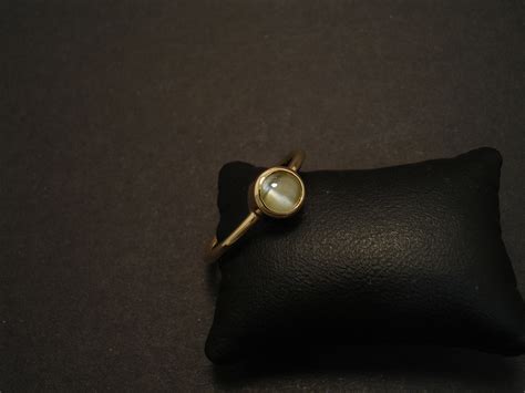 Maybe you would like to learn more about one of these? Cats Eye Gemstone, 18ct Gold Handmade - Christopher ...